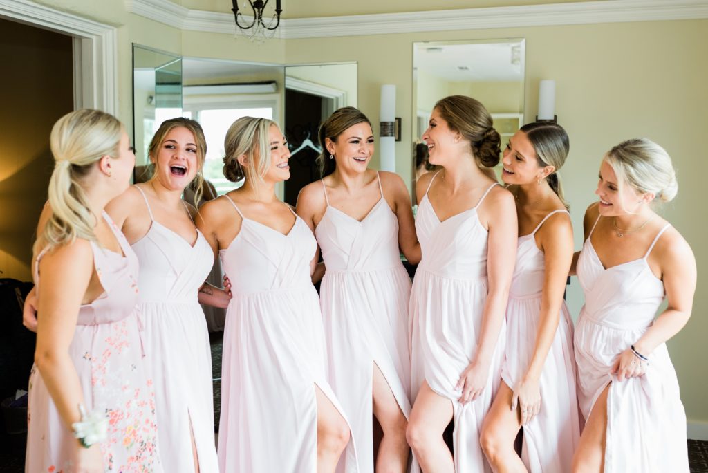 Bridesmaids smiling at the Lafayette Club.
