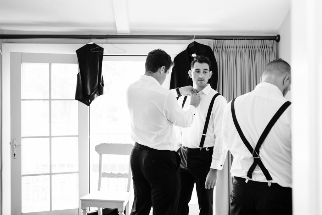 Groom and groomsmen getting ready.