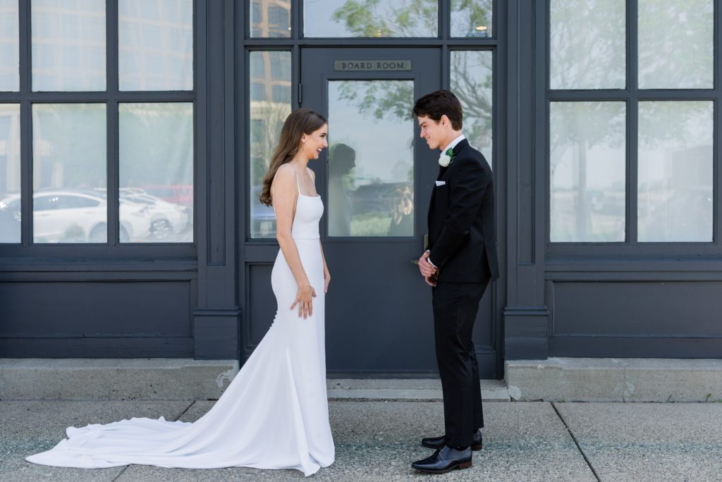 First look with bride and groom | Wedding at Metropolitan Ballroom.