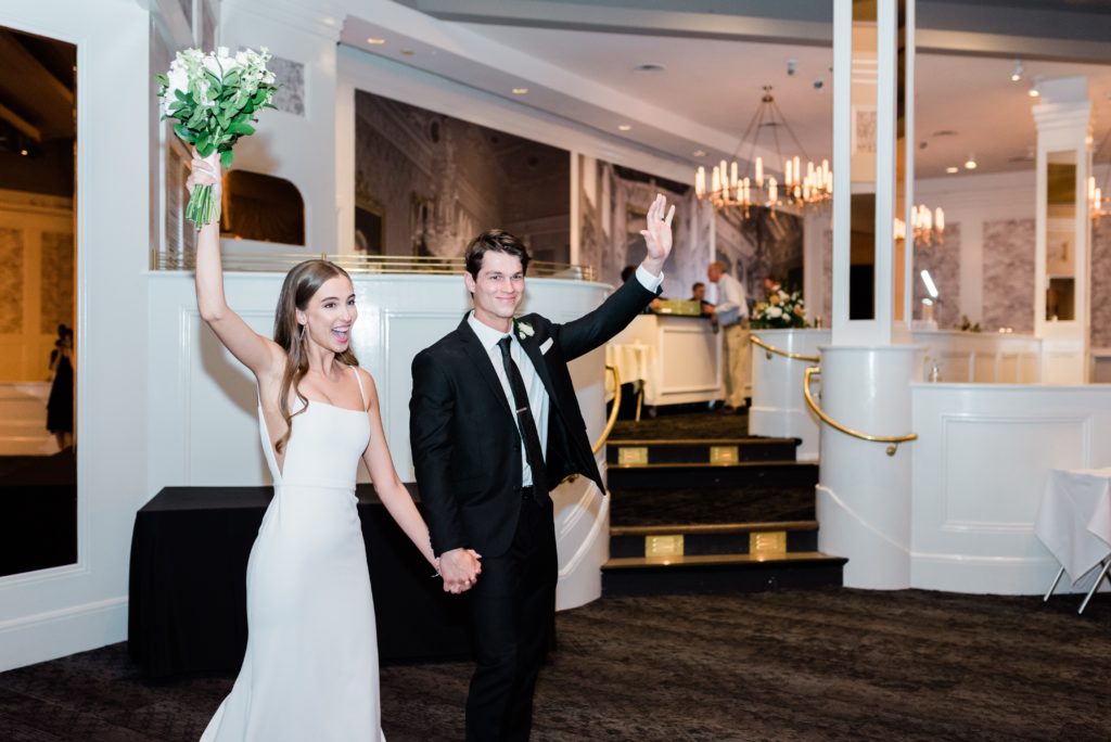 Bride and groom grand entrance at The Metropolitan Ballroom & Clubroom.