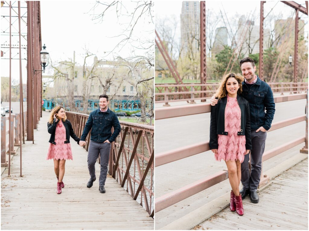 Couple walking and posing for engagement photos St. Anthony Main.