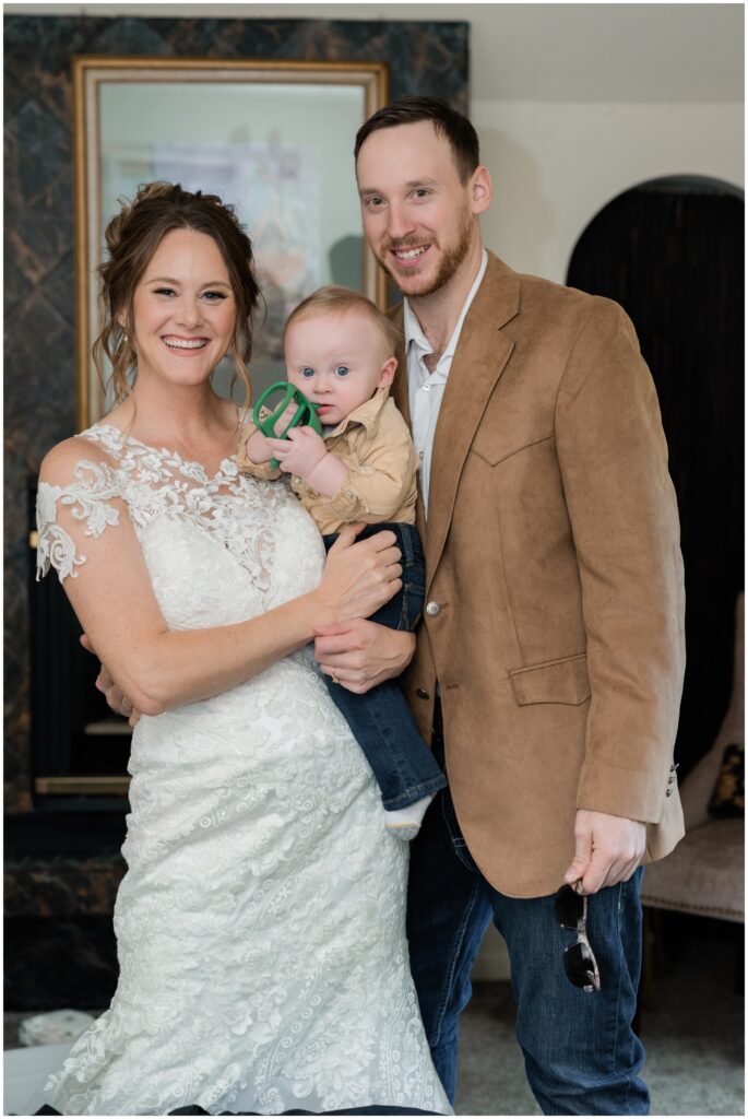 Bride, groom, and their son at James Mulvey Inn.