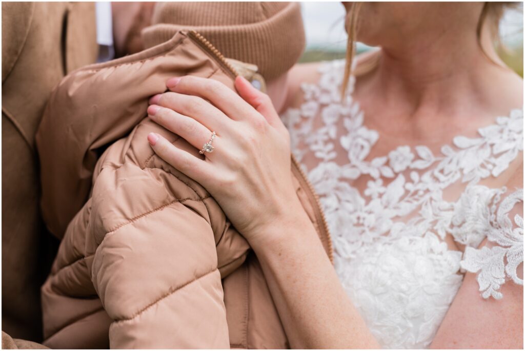 Wedding ring on their son's jacket.