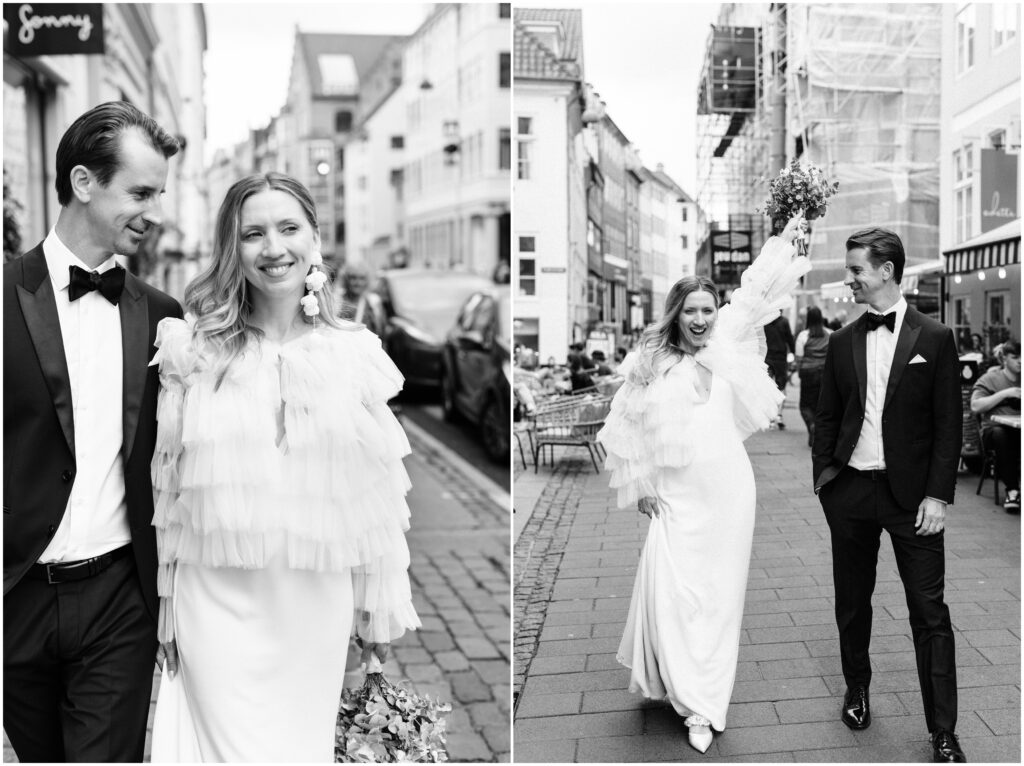 The bride and groom walk through the streets of Copenhagen. 