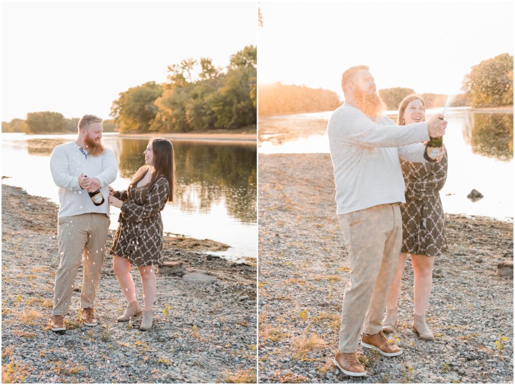 Engaged couple pop a bottle of champagne at Mississippi River. 
