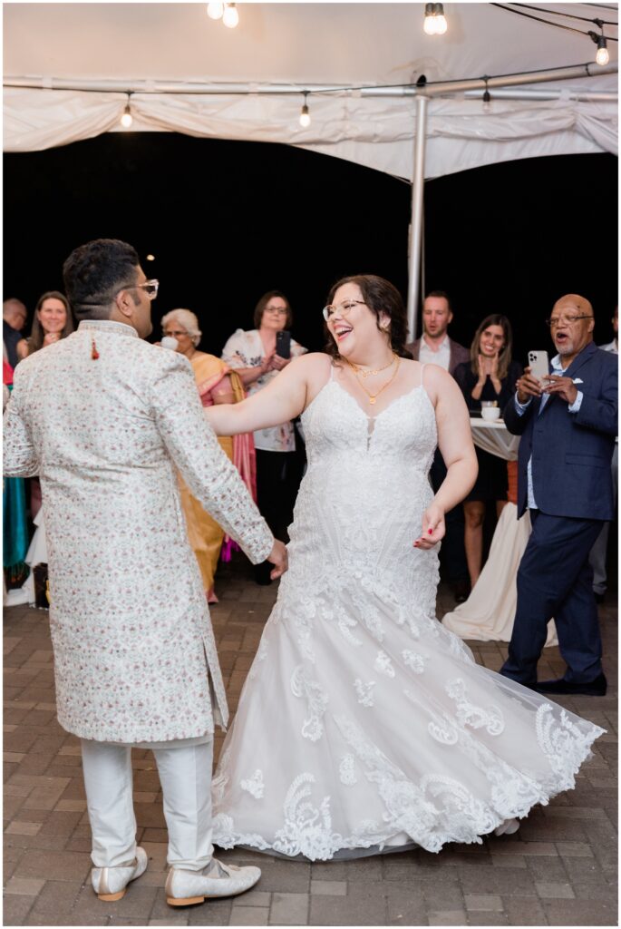 The bride and groom share their first dance at Cheney Mansion. 