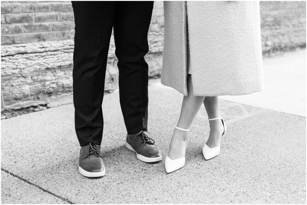 A detail photo of the couple's shoes.